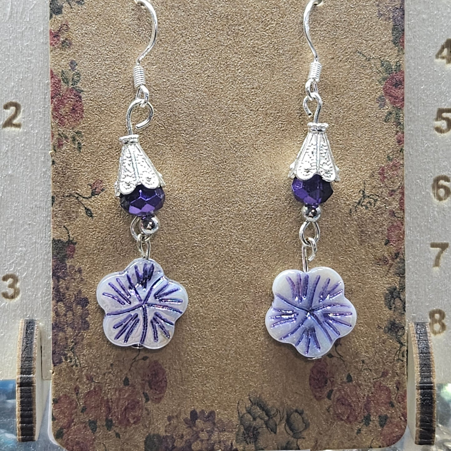 Purple floral dangle earrings