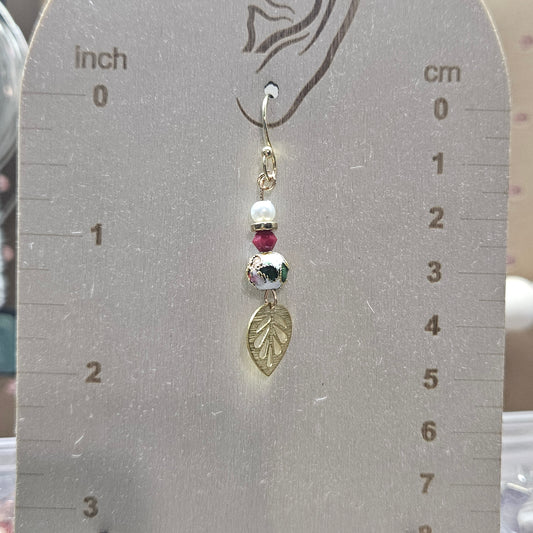 Gold and red earrings